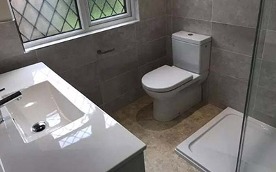 Completed bathroom plumbing and toilet installation