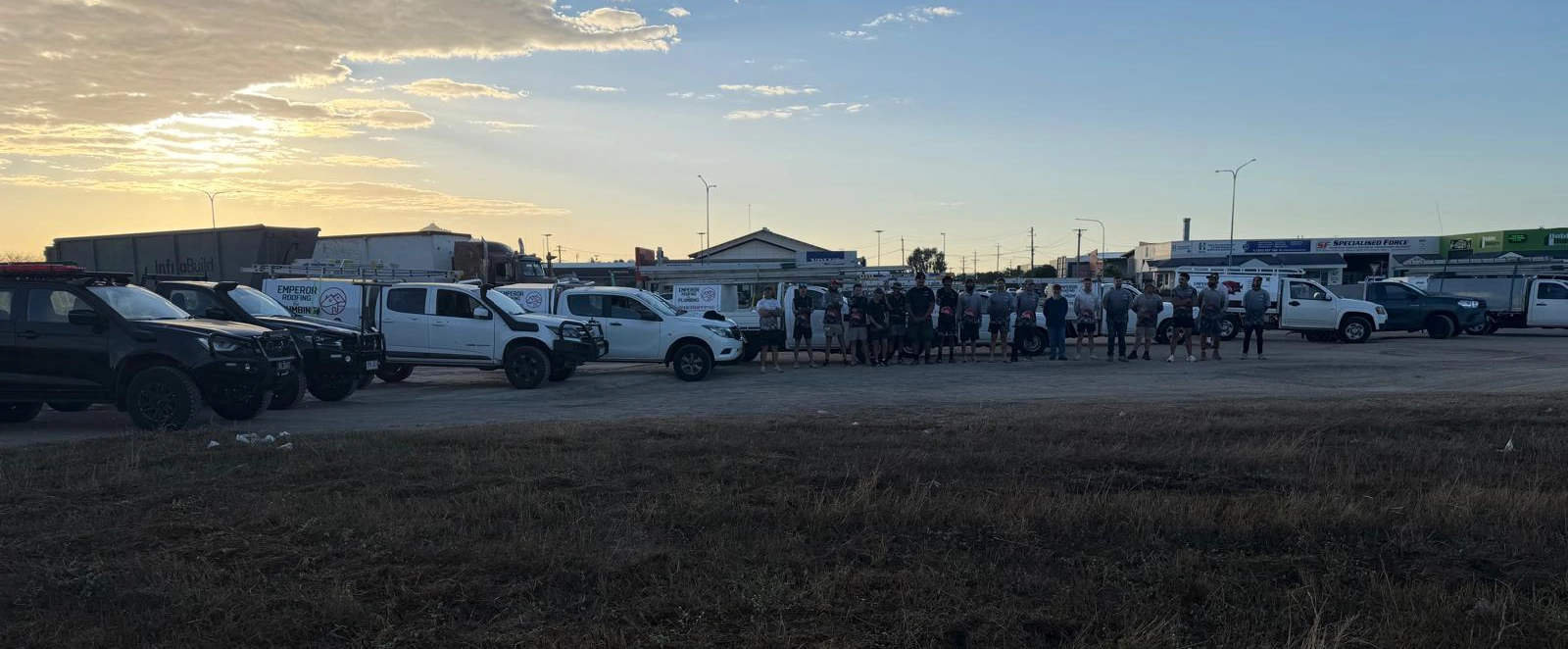 Emperor Roofing and Plumbing crew and work vehicles in Townsville