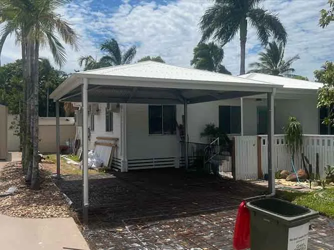 Completed metal-roofed residential carport