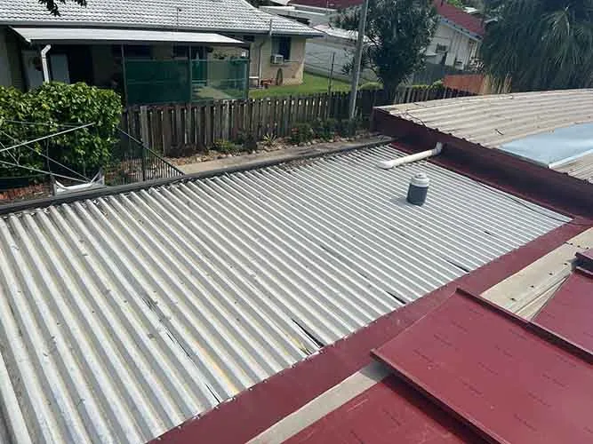 Patio roof before re-pitching and flashing work