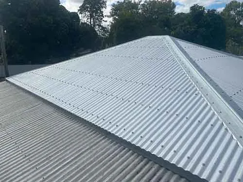 Small corrugated metal roof after replacement