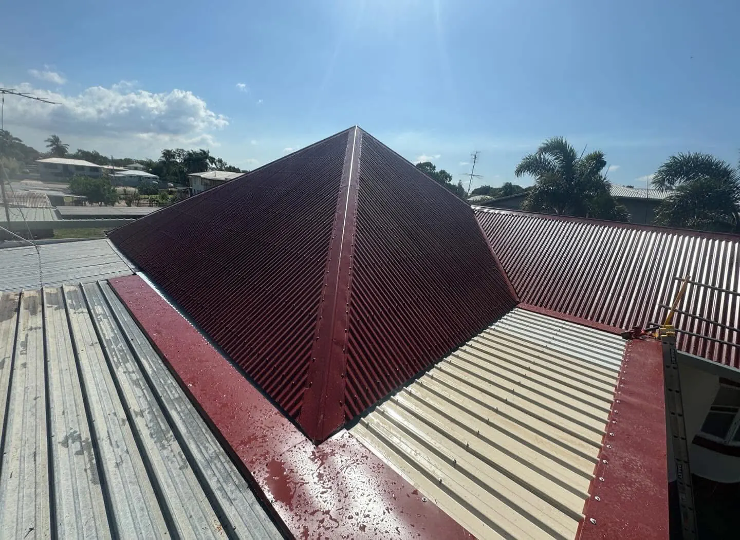 Completed red metal roof replacement