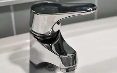 Chrome tap repaired and installed by Emperor Plumbing